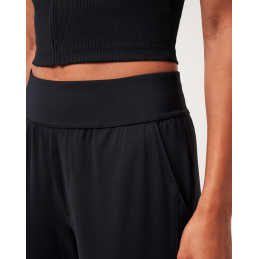 TravisMathew MoveKnit Resilience Pant – Dámské kalhoty pro aktivní živ